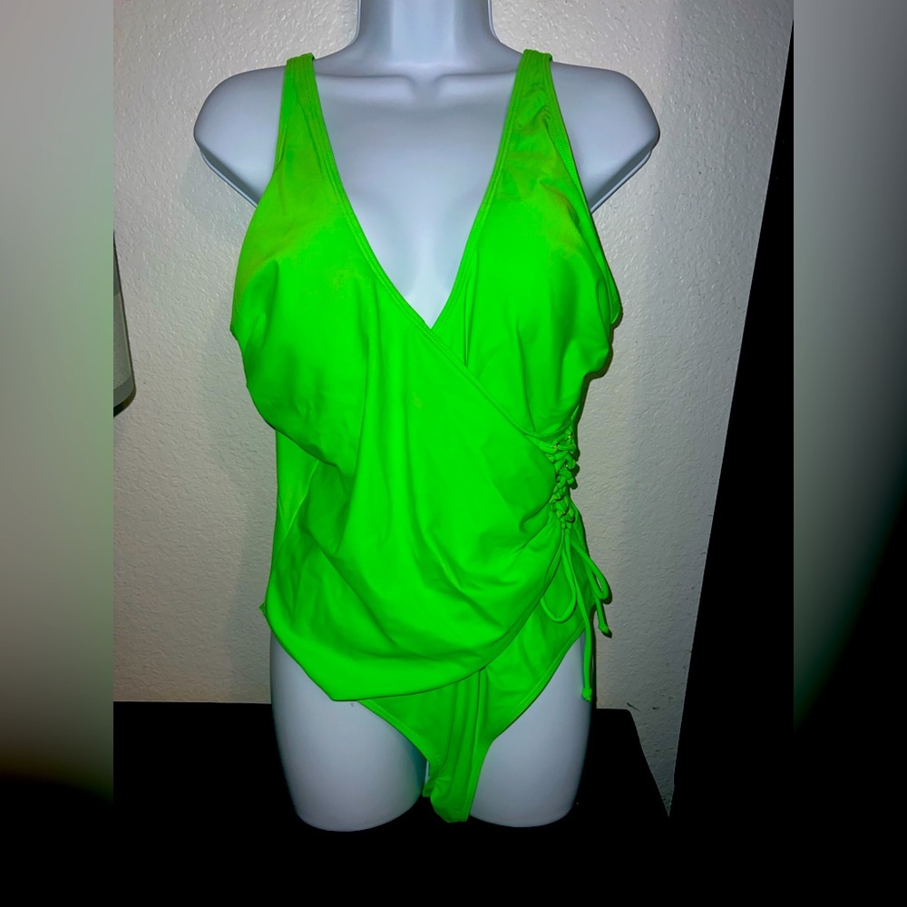 Bright lime green one piece swimsuit that laces up on the side! 💚💚💚